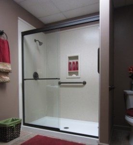 Stylish bathroom with walk in shower and glass door
